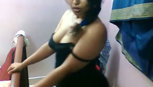 A bit plump brunette Indian webcam girlie stripteases and dances hot porn pics