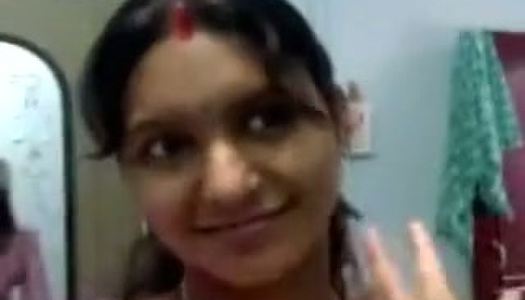 Dirty-minded ugly Indian married woman flashes her big tits in bra on cam porn pics