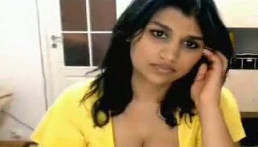 Chubby webcam Desi brunette plays with her huge tits and flashes hairy cunt porn pics