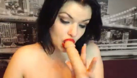 Classy Russian webcam model treats her dildo like a sweet lollipop porn pics