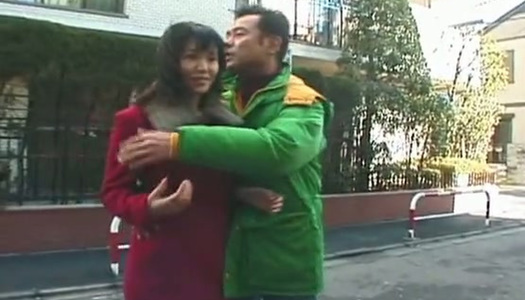 Lewd Japanese brunette flashes her naked body in the public mall porn pics