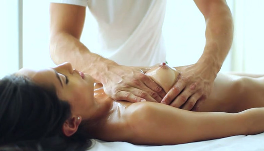 Alluring long haired black head gets fingered right in the massage parlor porn pics