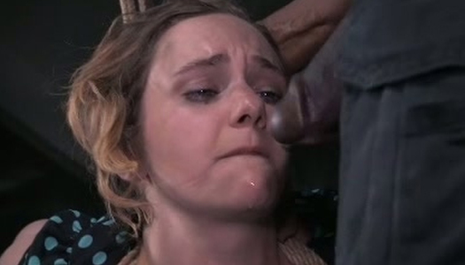 Heavily tied white sex doll gives steamy deep throat to black BDSM man porn pics