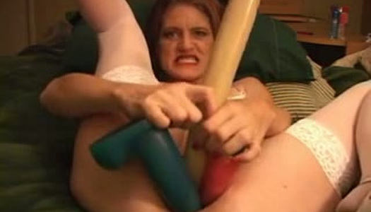 Nasty mature slut stretches vagina with monster sex toys porn pics