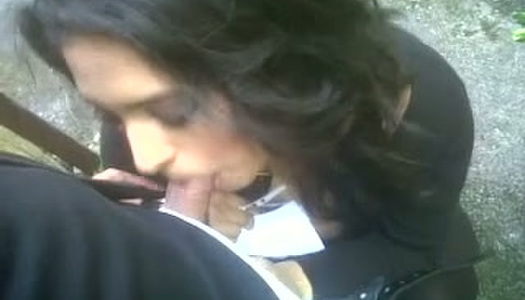 Cute Indian babe sucking cock in the back yard porn pics