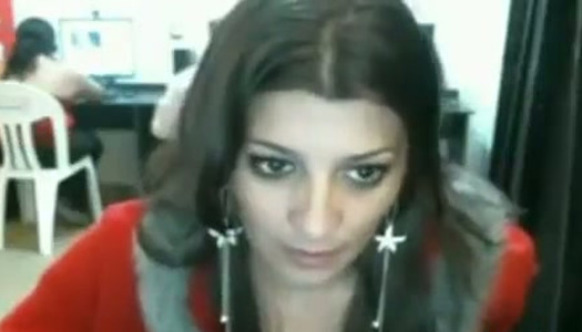 Amateur Indian chick flashes her titties in Internet cafe porn pics