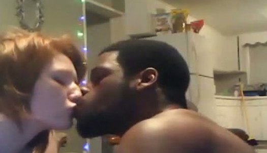 Redheaded hottie lusts for her boyfriend's big black cock porn pics