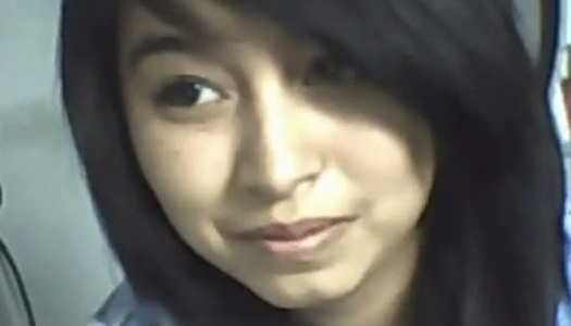 Cute and sexy Asian gal fingering her hairy pussy in solo video porn pics