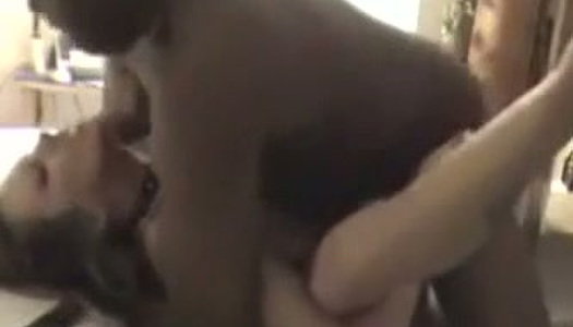 Hunky black stud fucks busty white chick in a doggy position porn pics