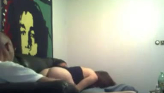 This amateur bimbo is having an amazing threesome on the couch porn pics