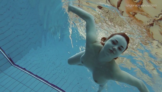 Salacious babe Lada Poleshuk shows her tits and pussy under the water porn pics