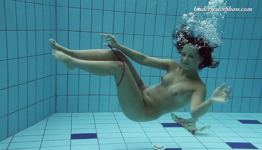 Hot swimming chick Krasula Fedorchuk takes off clothes under the water porn pics