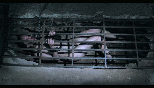 Slutty chick in the cage Sierra Cirque gets punished in the dark cold room porn pics