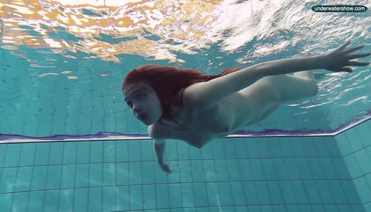 Ginger hottie Libuse takes off her red dress under the water porn pics