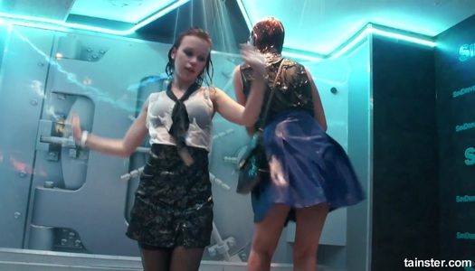Two lesbian chicks dance and touch each other under the shower at the party porn pics