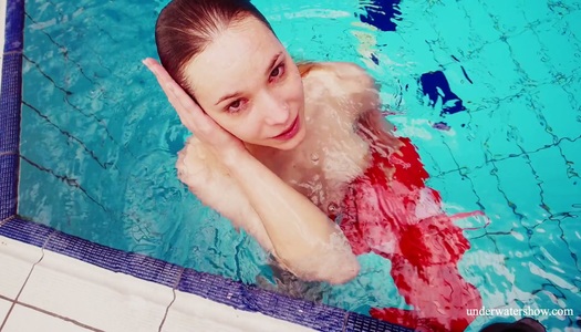 Stunning babe Avenna is stripping and swimming under the water porn pics