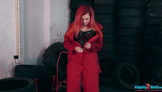 Red haired hooker Dolly shows striptease in the tire shop porn pics