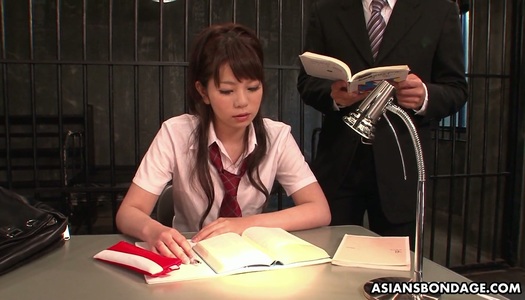 Salacious Japanese girk is tied up and toyed by two kinky dudes porn pics