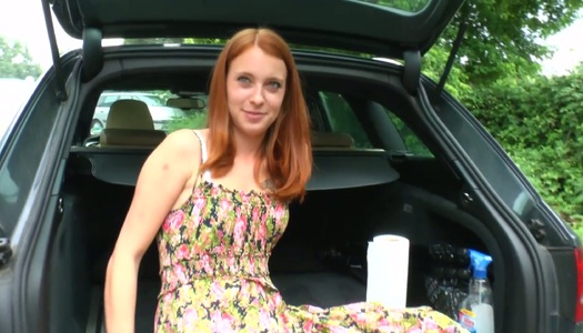 Yummy ginger girlfriend is masturbating her whorish pussy in the trunk porn pics