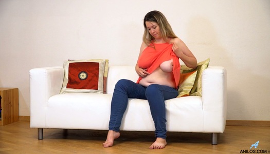 Sex-hungry housewife Anastasiya plays with her massive tits and juicy puffy snatch porn pics