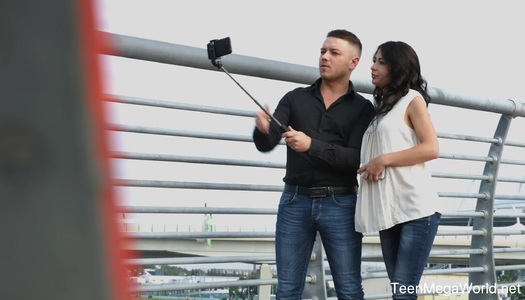 Sexually charged brunette Roxy Sky gives a sensual blowjob and gets her slit nailed porn pics