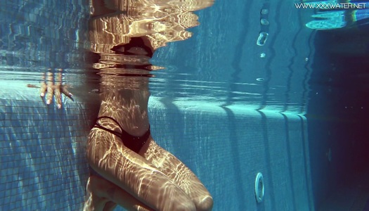 Underwater striptease by sex-appeal babe with plump ass Tiffany Tatum porn pics