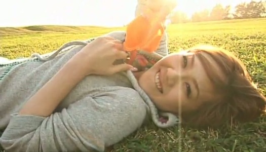Cheerful Japanese teen Revive goofs around in the field wearing bikini porn pics