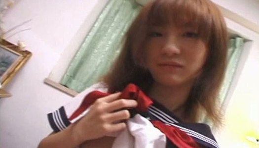Mesmerizing Japanese student Himiko gives a head to hard cock porn pics
