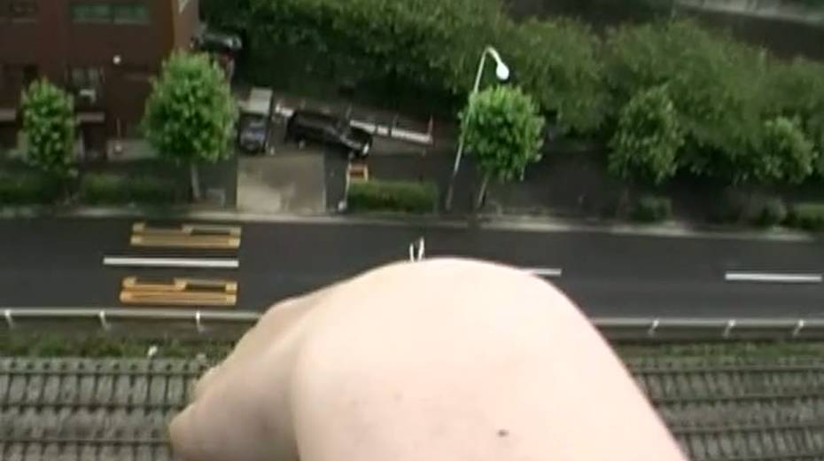 Skinny Japanese girl gives deepthroat blowjob on a balcony - 11. pic
