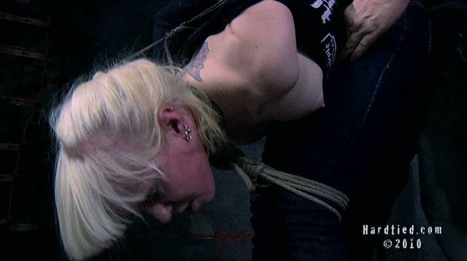 Chick with tattoo on her hip is tied up and fucked with stick - 5. pic