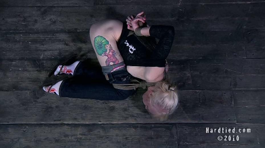 Chick with tattoo on her hip is tied up and fucked with stick - 7. pic