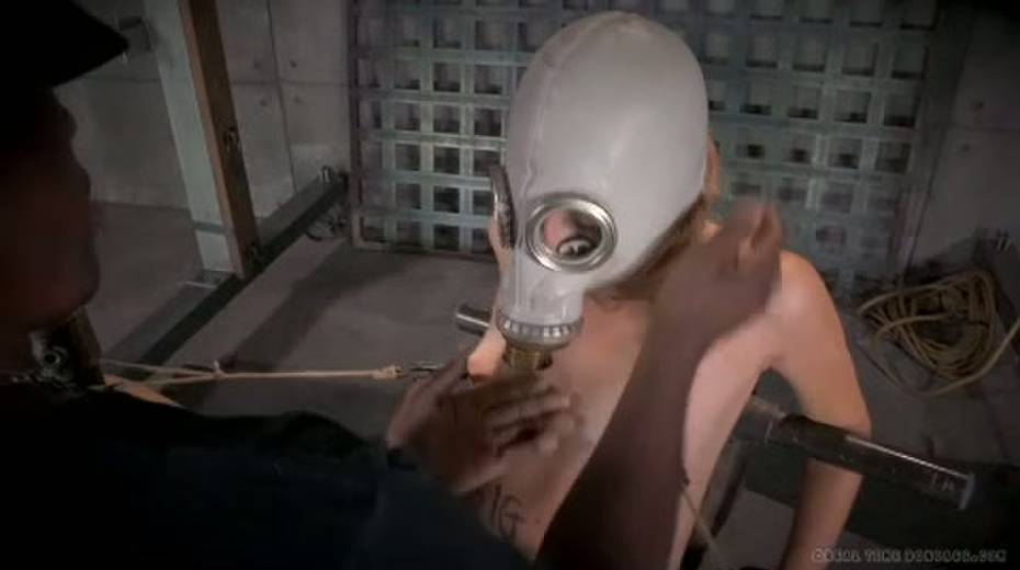 Black master is conducting experiments on nude sex-slave in gas mask - 6. pic