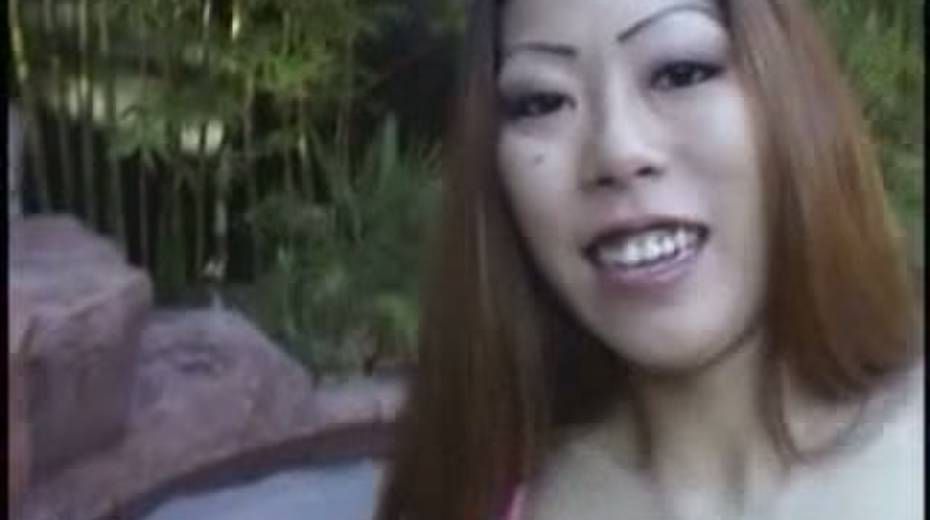 Lusty Asian whore Ayako gives head in an outdoor pool - 9. pic