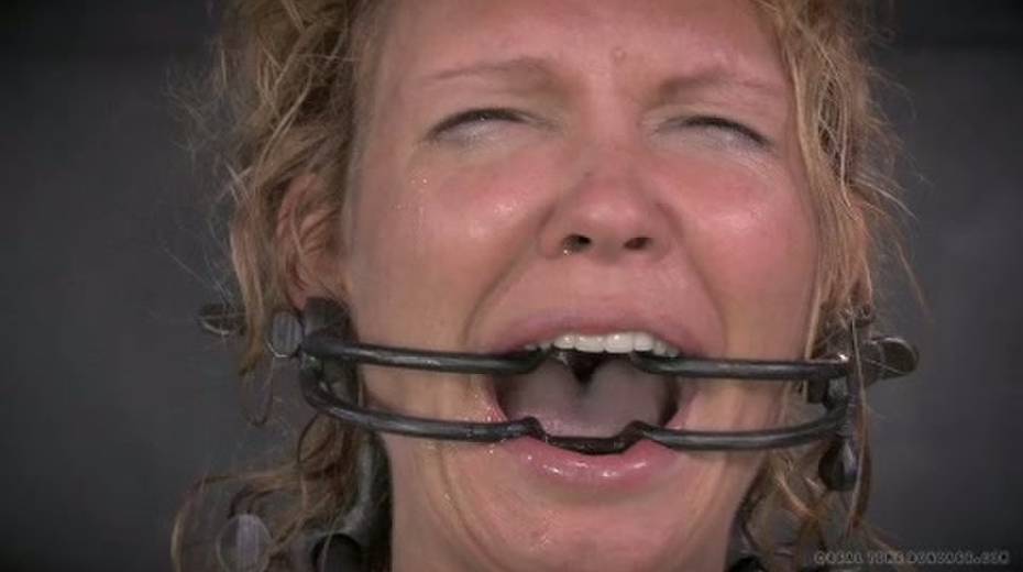 Filthy blonde is shackled to a wooden chair and electrocuted - 10. pic