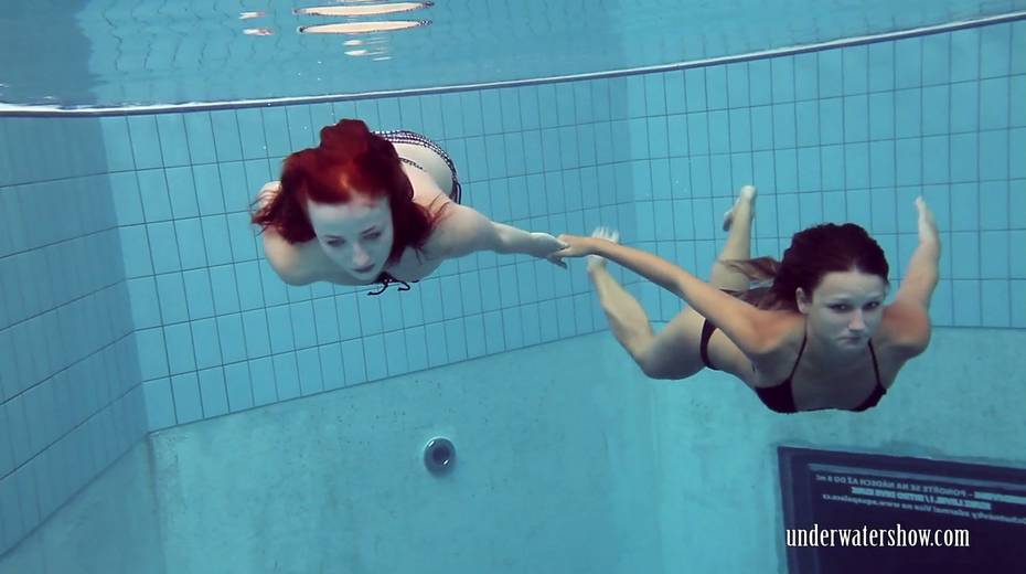 Two naughty babes undress under the water and does tricks - 2. pic