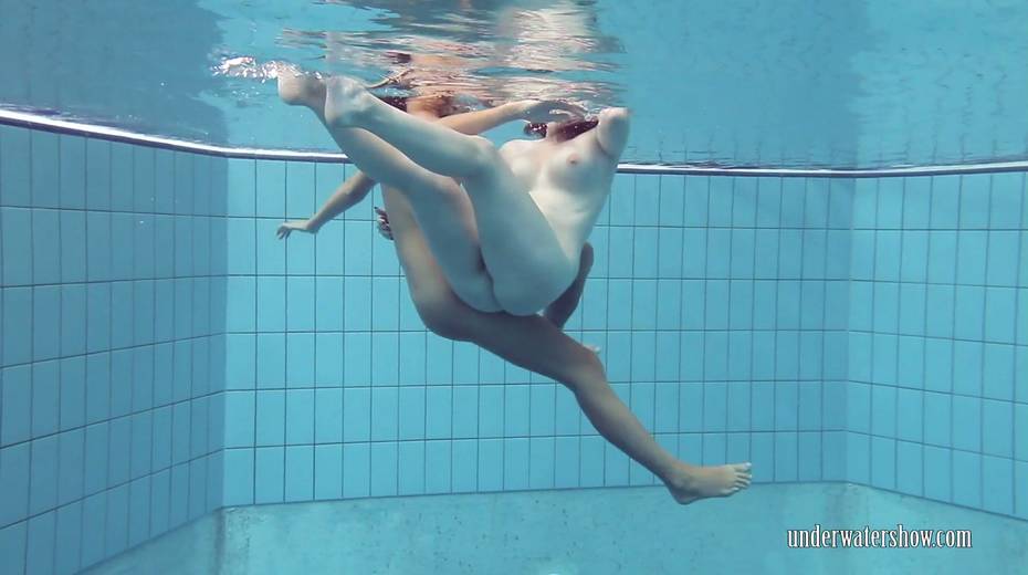 Two naughty babes undress under the water and does tricks - 11. pic