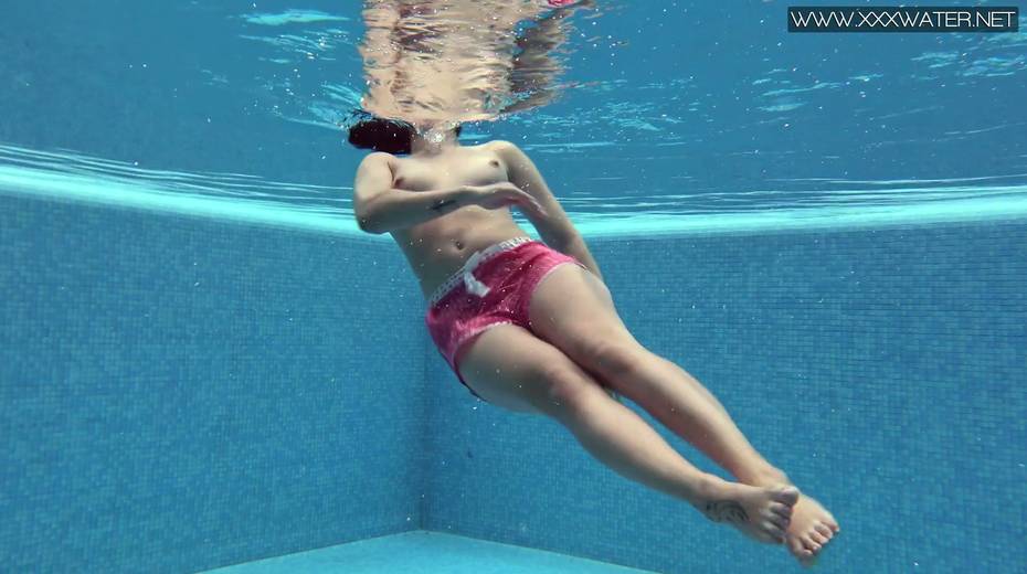 Libidinous brunette Lady Dee gets naked and shows tricks under the water - 9. pic