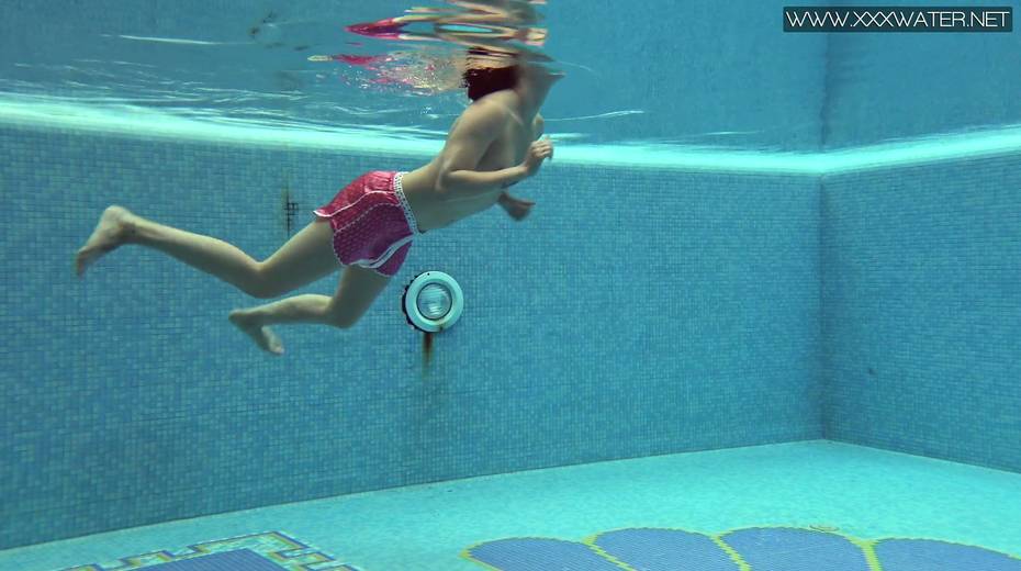 Libidinous brunette Lady Dee gets naked and shows tricks under the water - 10. pic
