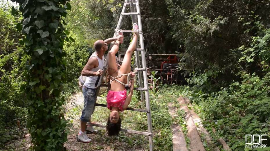 Horny guy fucks tied up and restrained brunette slut outdoor - 4. pic
