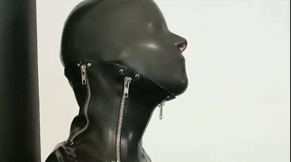 Busty porn model in rubber costume is tied up on the floor - 4. pic