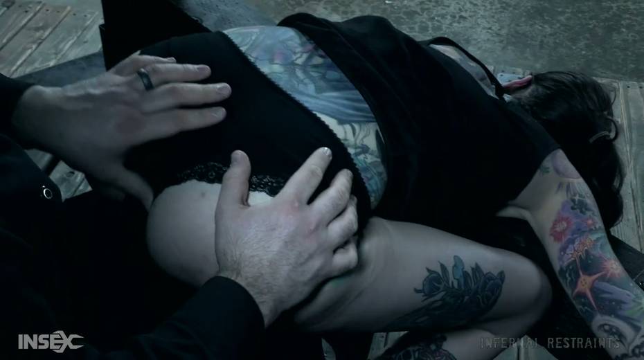 Tattooed sassy chick Rocky Emerson is punished in the dark room - 3. pic