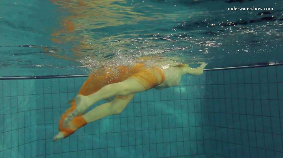Pretty hot red head Nastya is stripping under the water - 4. pic