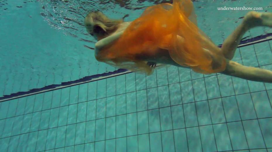 Pretty hot red head Nastya is stripping under the water - 6. pic