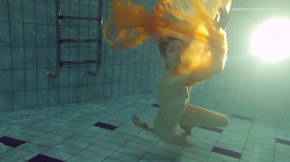 Pretty hot red head Nastya is stripping under the water - 8. pic
