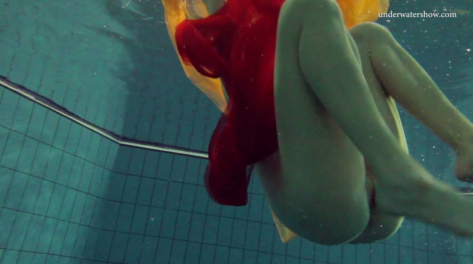 Pretty hot red head Nastya is stripping under the water - 13. pic