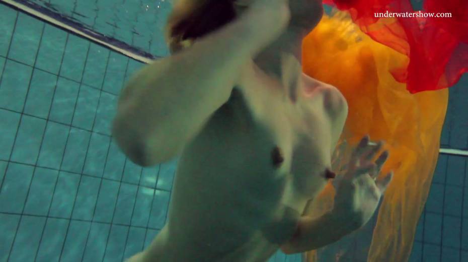 Pretty hot red head Nastya is stripping under the water - 14. pic