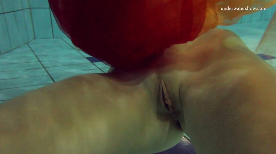 Pretty hot red head Nastya is stripping under the water - 19. pic