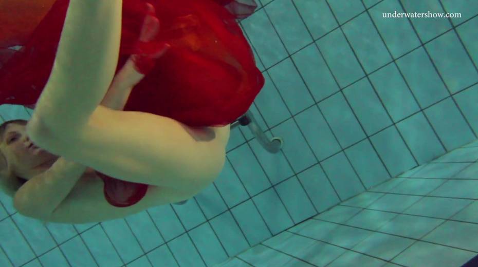 Pretty hot red head Nastya is stripping under the water - 20. pic