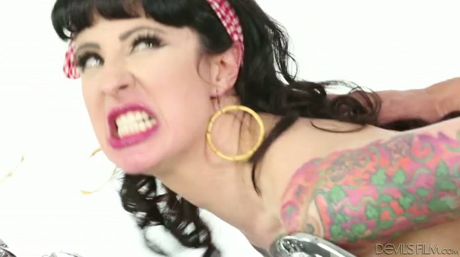 Inked sex goddess boned hard in a doggy position bending over a bike - 4. pic