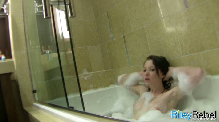 Pretty all natural brunette girlie Riley Rebel poses all nude in the bathroom - 7. pic